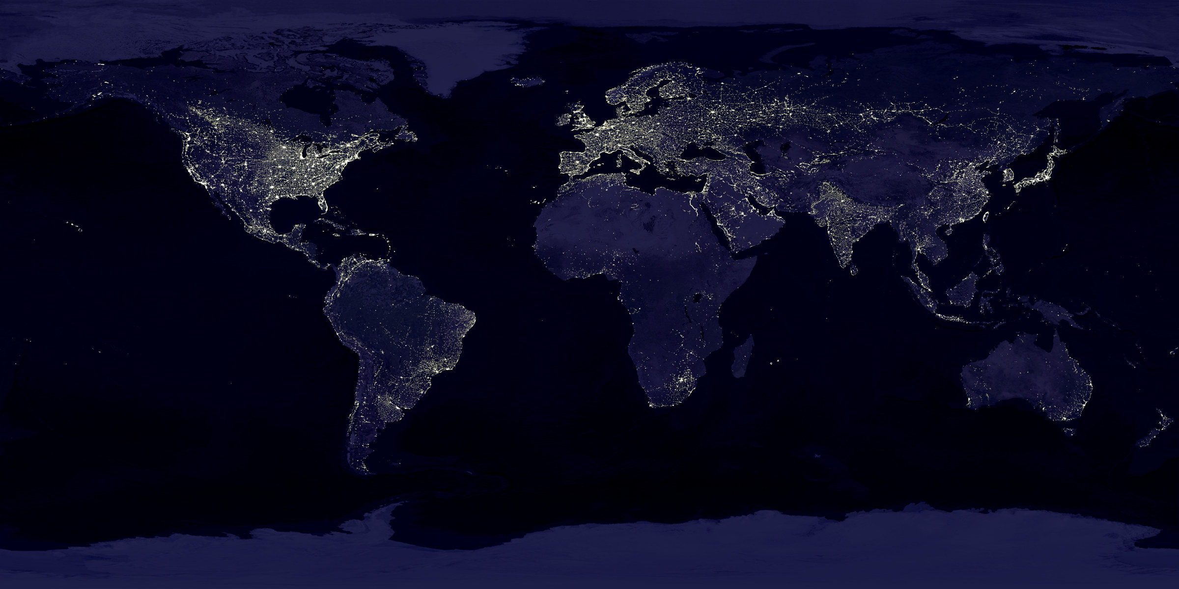 World map at night showing cities as bright connected clusters
